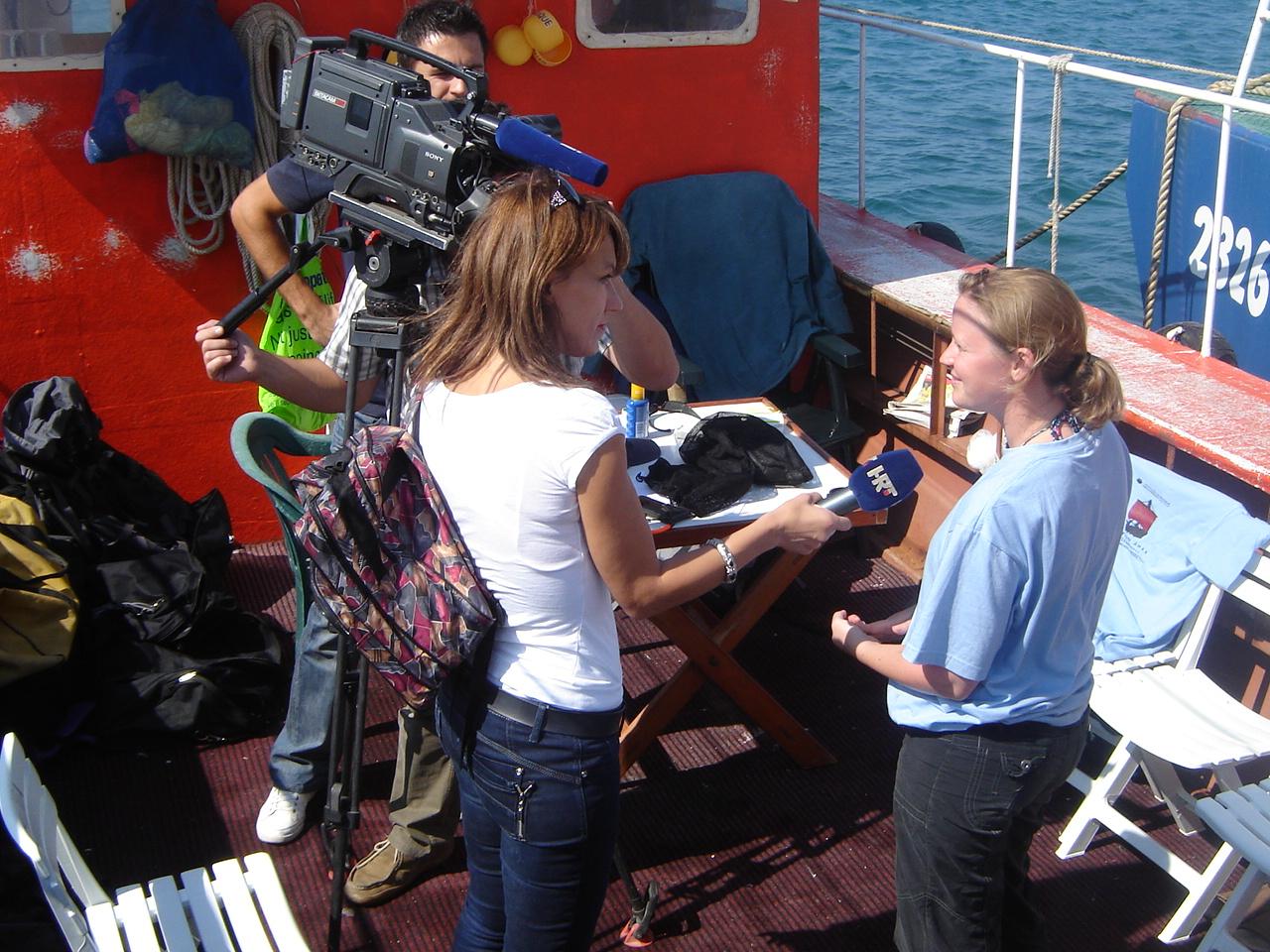 Being interviewed by the media